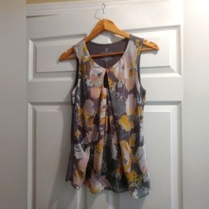 Flowy, loose fitting tank top.
